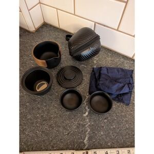 Black Ceramic Travel Tea Set with Wooden Accents and Carrying Case